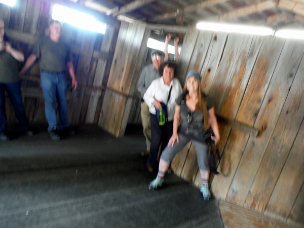 Karen Duquette trying to walk in the crooked cabin